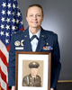 GABRIELE PROMOTED TO COLONEL – Mandi (Jenkins) Gabriele, a Belgrade native, was promoted to Colonel on Sept. 20th, 2023 at the Pentagon in D.C. Here, Colonel Gabriele displays a photo of Jimmy Dale Jenkins, Vietnam Army Veteran, and her father.