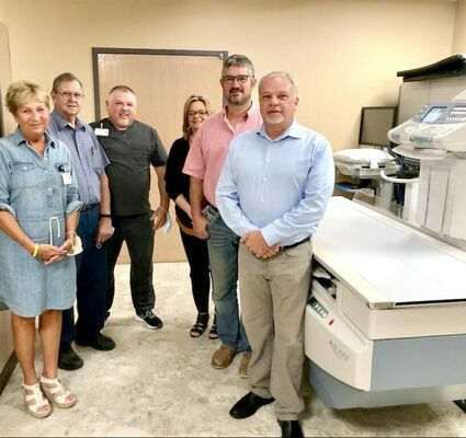 New Radiology EQUIPMENT AT WCMH – from left: Michele Meyer, Hospital C.E.O.; Melvin Warden, Hospital Board Chairman; Randy Dunn, Radiology Director at W.C.M.H.; Debra Pratt, Hospital C.F.O.; Doug Short, 1st District County Commissioner; and Dave Sansegraw, Presiding Commissioner.	(Sub. Photo)