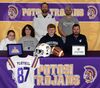 Gavin was joined by his mom and dad, Nicole and Joe Portell along with little sister, Lilli. Standing at back are P.H.S. Athletic Director Steven McCoy, left, and P.H.S. Football Head Coach Dylan Wyrick, right.